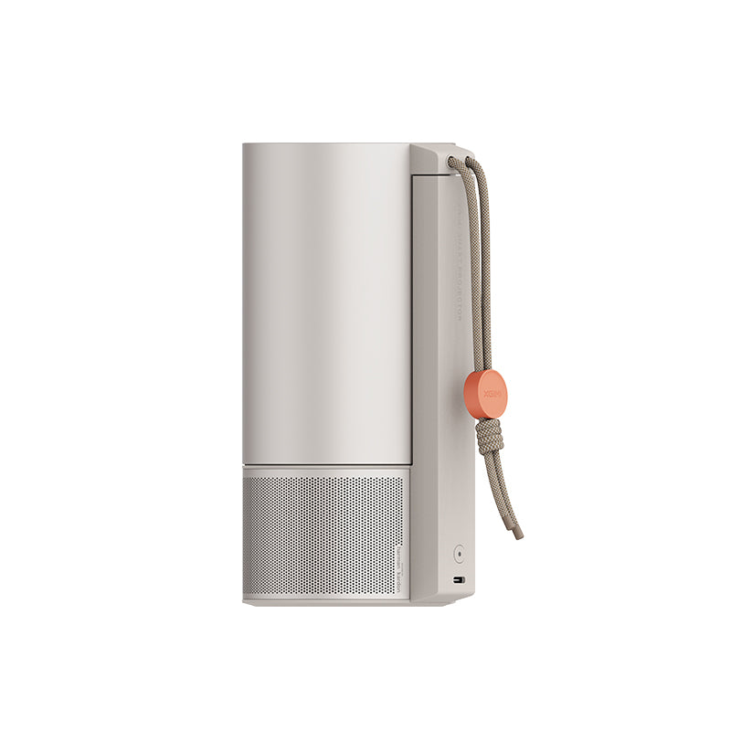 Side view of the XGIMI MoGo 3 Pro showing the speaker grille, USB-C port and lanyard